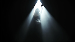 Vanessa Williams singing in silhouette