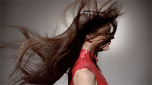fashion model hair blowing in the wind profile