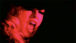 Traci Lords "Last Drag" Music Video with hat open mouth