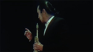 JMancera holding saxophone