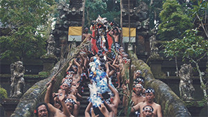 Balinese ritual in traditional costumes at temple