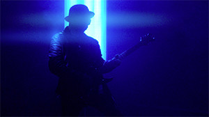 Morning After music video still of Anthony Fonseca playing guitar