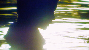 Boy in water silhouette