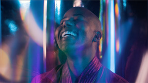black performer in avalona music video laughing ecstasy